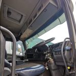Volvo FM 400 dashboard and steering wheel from driver seat, I-Shift gear lever, well-maintained interior