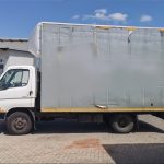 Side view of used Hyundai Mighty HD65 dropside truck Johannesburg – sturdy build, low mileage, ready for work Gauteng